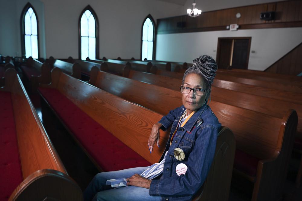 Civil Rights foot soldier Della Simpson Maynor poses for a photo on May 19, 2023, at Zion Church in Marion, Ala. On Feb. 18, 1965, the 14-year-old Maynor was part of a group planning to march to the Perry County jail where a local SCLC field secretary was being held for registering voters. State and local police met the protestors with violence just outside the church where Maynor was clubbed and heard the gunshots that fatally wounded activist Jimmie Lee Jackson. (AP Photo/Julie Bennett)
