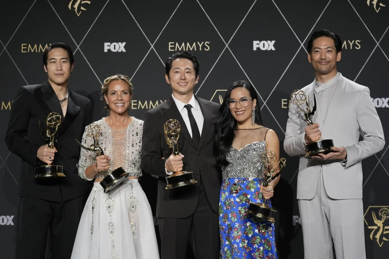 Young Mazino, from left, Maria Bello, Steven Yeun, Ali Wong, and Joseph Lee, winners of the award for outstanding limited or anthology series for "Beef," pose in the press room during the 75th Primetime Emmy Awards on Monday, Jan. 15, 2024, at the Peacock Theater in Los Angeles. (AP Photo/Ashley Landis)
