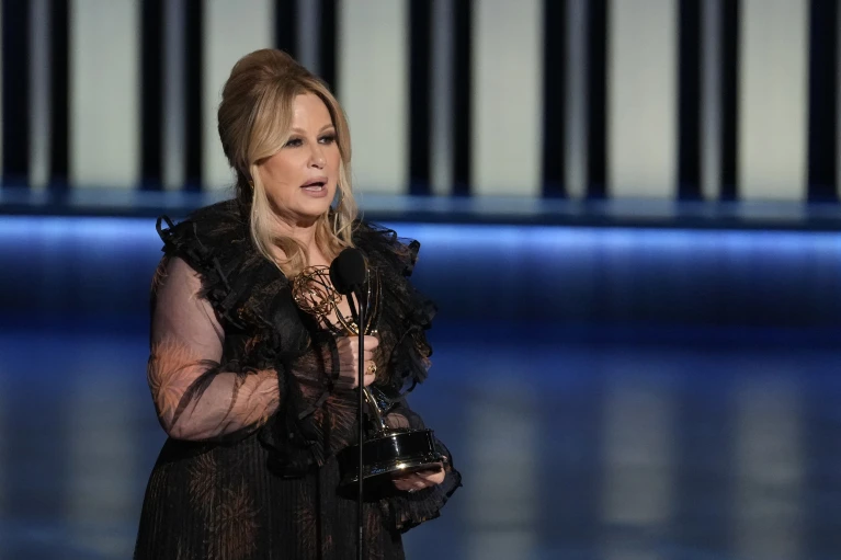 Jennifer Coolidge accepts the award for outstanding supporting actress in a drama series for "The White Lotus" during the 75th Primetime Emmy Awards on Monday, Jan. 15, 2024, at the Peacock Theater in Los Angeles. (AP Photo/Chris Pizzello)
